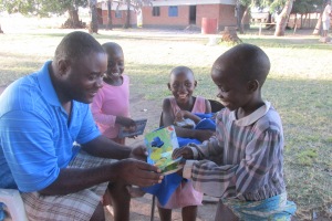 Zach interacting with orphans from the Harvest Hope Home 